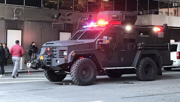 An armoured police truck occupies the street outside of the New York Port Authority in New York City, U.S. December 11, 2017 after reports of an explosion - Sputnik International