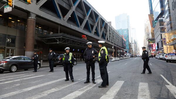 Police officers stand outside the New York Port Authority Bus Terminal in New York City, U.S. December 11, 2017 after reports of an explosion - Sputnik International