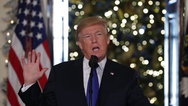 U.S. President Donald Trump delivers a speech on tax reform legislation at the White House in Washington, U.S., December 13, 2017 - Sputnik International