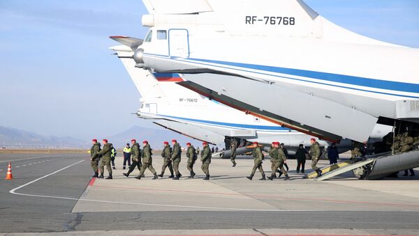 An Ilyushin IL-76MD aircraft with a military police battalion on board arrives in Makhachkala from Syria. File photo - Sputnik International