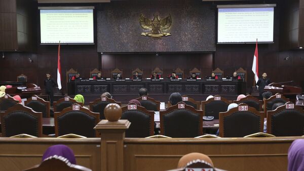 Judges read their verdict on the case of a petition seeking to make gay sex and sex outside marriage illegal during a hearing at the Constitutional Court in Jakarta, Indonesia - Sputnik International