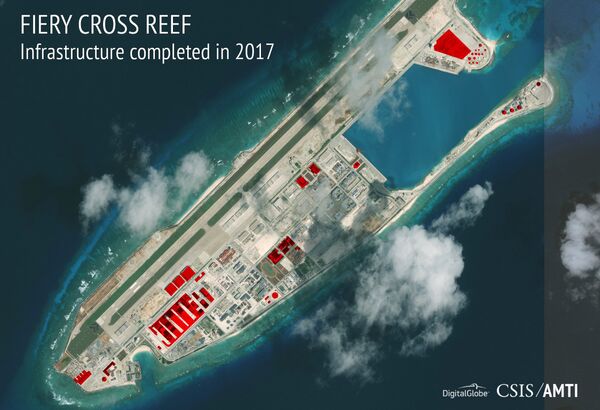 This image provided by CSIS Asia Maritime Transparency Initiative/DigitalGlobe shows a satellite image of Fiery Cross Reef in Spratly island chain in the South China Sea, annotated by the source to show areas where China has conducted construction work above ground during 2017 This image provided by CSIS Asia Maritime Transparency Initiative/DigitalGlobe shows a satellite image of Fiery Cross Reef in Spratly island chain in the South China Sea, annotated by the source to show areas where China has conducted construction work above ground during 2017 - Sputnik International