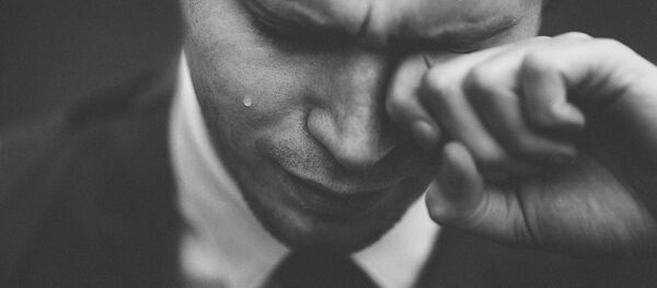 Man cries - Sputnik International