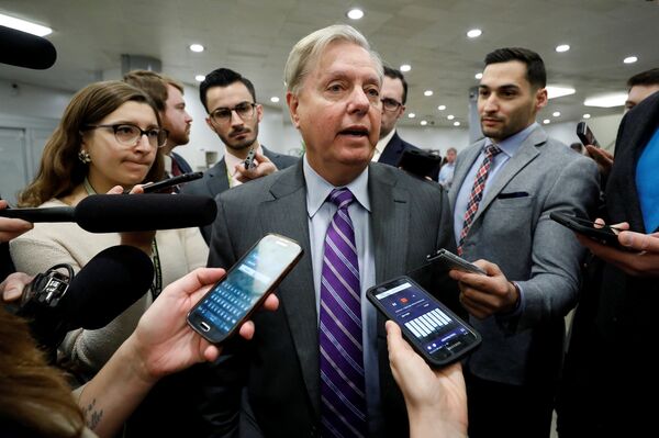 Sen. Lindsey Graham speaks with reporters ahead of votes on Capitol Hill in Washington, U.S., December 6, 2017 - Sputnik International