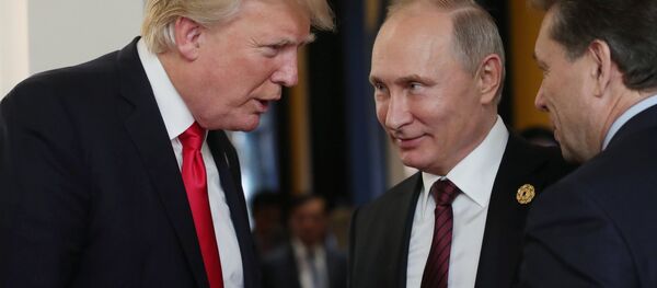Russian President Vladimir Putin and US President Donald Trump, left, are seen here during a break in a working session at the Asia-Pacific Economic Cooperation Economic Leaders' Meeting Russian President Vladimir Putin and US President Donald Trump, left, are seen here during a break in a working session at the Asia-Pacific Economic Cooperation Economic Leaders' Meeting - Sputnik International