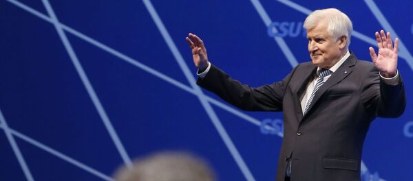 Outgoing Bavarian State Premier and head of the Christian Social Union (CSU) Horst Seehofer acknowledges the applause after his speech during the Christian Social Union (CSU) party congress in Nuremberg, Germany, December 16, 2017 - Sputnik International