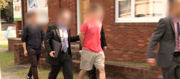 Australian Federal Police (AFP) officers arrest a man during operation BYAHAUT in this handout obtained on December 17, 2017 Australian Federal Police (AFP) officers arrest a man during operation BYAHAUT in this handout obtained on December 17, 2017 - Sputnik International