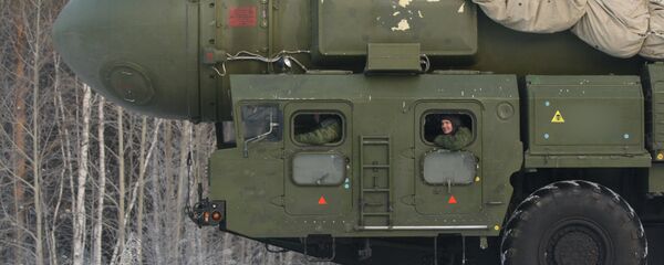 The RT-2PM Topol ballistic missile riding to the site of its permanent deployment with the Strategic Missile Forces of the Central Military District The RT-2PM Topol ballistic missile riding to the site of its permanent deployment with the Strategic Missile Forces of the Central Military District - Sputnik International