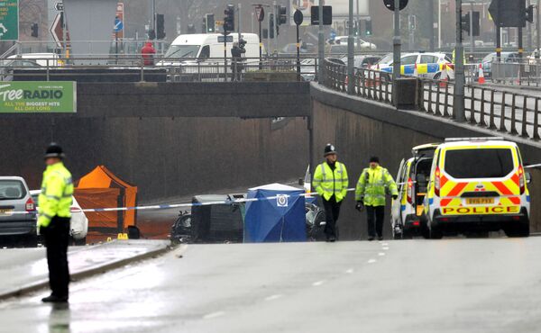 Police and emergency services are seen working at the scene of a multiple car crash on Lee Bank Middleway in central Birmingham, Britain, December 17, 2017 Police and emergency services are seen working at the scene of a multiple car crash on Lee Bank Middleway in central Birmingham, Britain, December 17, 2017 - Sputnik International