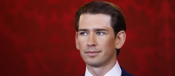 Head of the People's Party Sebastian Kurz reacts during the swearing-in ceremony of the new government in Vienna Head of the People's Party Sebastian Kurz reacts during the swearing-in ceremony of the new government in Vienna - Sputnik International