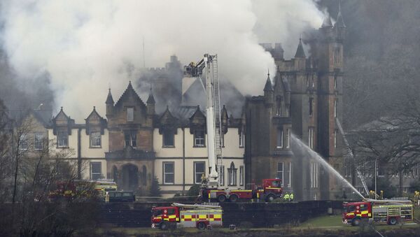 Firefighters attend the scene of a major fire at the Cameron House Hotel on the banks of Loch Lomond in Scotland - Sputnik International