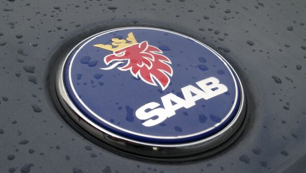 In this Feb. 23, 2009 file picture a Saab logo covered with raindrops is seen on a car in Frankfurt, Germany - Sputnik International