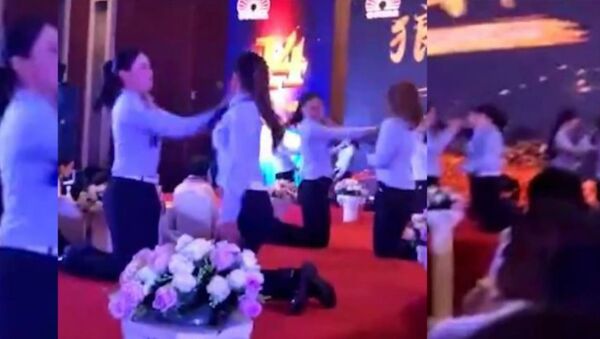 Bizarre viral video shows a dozen women forced to slap each other across the face in ‘team - Sputnik International