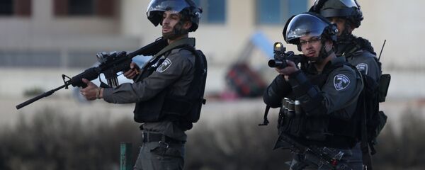 Israeli soldiers during clashes with protesters in Palestine against the decision to recognize Jerusalem as the capital of Israel Israeli soldiers during clashes with protesters in Palestine against the decision to recognize Jerusalem as the capital of Israel - Sputnik International