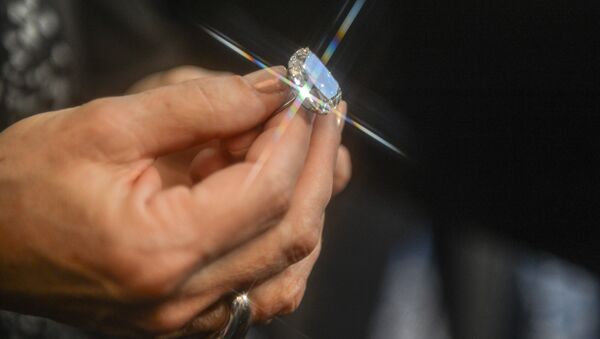 Ring with a diamond  - Sputnik International