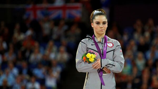 McKayla Maroney of the U.S. celebrates with her silver medal in the women's vault victory ceremony in the North Greenwich Arena during the London 2012 Olympic Games August 5, 2012 - Sputnik International