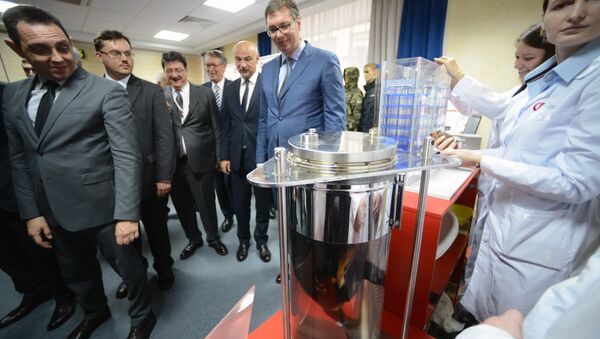 Deputy Russian Prime Minister Dmitry Rogozin, second left, visits the Advanced Research Foundation of the Roscosmos State Corporation for Space Activities - Sputnik International