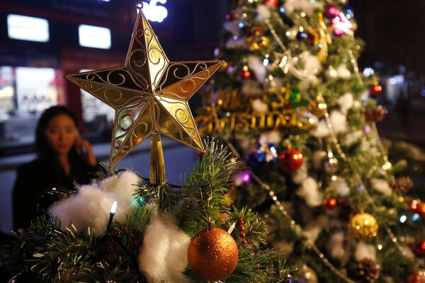 Christmas decoration items are displayed for sale at a shop in Hanoi, Vietnam - Sputnik International