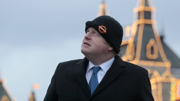 British Foreign Secretary Boris Johnson is seen near he State Department Store, GUM, as he visits Red Square in Moscow, Russia December 22, 2017 - Sputnik International