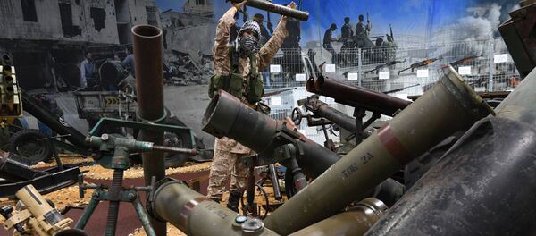 Self-made and industrially produced arms seized from Syrian terrorists at the exhibition devoted to the Russian Aerospace Forces' operation in Syria, as part of the Army 2017 International Military-Technical Forum at the Alabino training ground. - Sputnik International