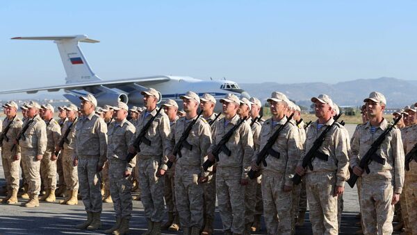 Russian army servicemen during the ceremony of meeting President Vladimir Putin at the Khmeimim Air Base in Syria - Sputnik International