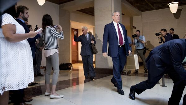 Longtime Donald Trump associate Roger Stone, center, arrives to speak to members of the media after testifying before the House Intelligence Committee, on Capitol Hill, Tuesday, Sept. 26, 2017, in Washington. Stone says there is not one shred of evidence that he was involved with Russian interference in the 2016 election. Stone's interview comes as the House and Senate intelligence panels are looking into the Russian meddling and possible links to Trump's campaign. - Sputnik International