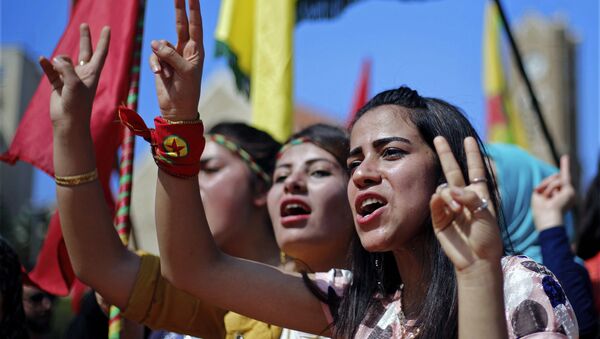 Supporters of the Kurdistan Workers' Party, known as the PKK, chant slogans as they flash victory signs during a demonstration demanding the release of Kurdish guerrilla leader Abdullah Ocalan, in front of the United Nations Headquarters in Beirut, Lebanon, Sunday, Sept. 24, 2017. Ocalan, the founder of the PKK, was captured in Kenya after being forced to leave a Greek diplomatic mission there in 1999, and was sentenced to death for leading an insurgency fighting for Kurdish autonomy in Turkey's southeast that has claimed tens of thousands of lives since 1984. - Sputnik International