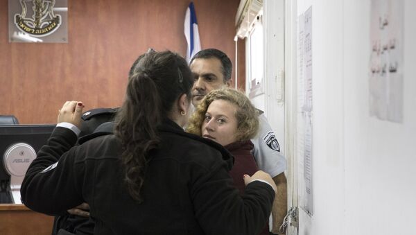 ISRAEL OUT - Palestinian Ahed Tamimi Is escorted at a military court near Jerusalem, Wednesday, Dec. 20, 2017 - Sputnik International