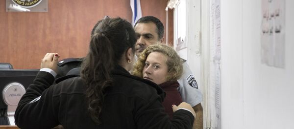 ISRAEL OUT - Palestinian Ahed Tamimi Is escorted at a military court near Jerusalem, Wednesday, Dec. 20, 2017 - Sputnik International