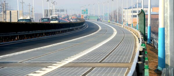 A solar panel expressway is seen before its opening in Jinan, Shandong province, China December 28, 2017 A solar panel expressway is seen before its opening in Jinan, Shandong province, China December 28, 2017 - Sputnik International