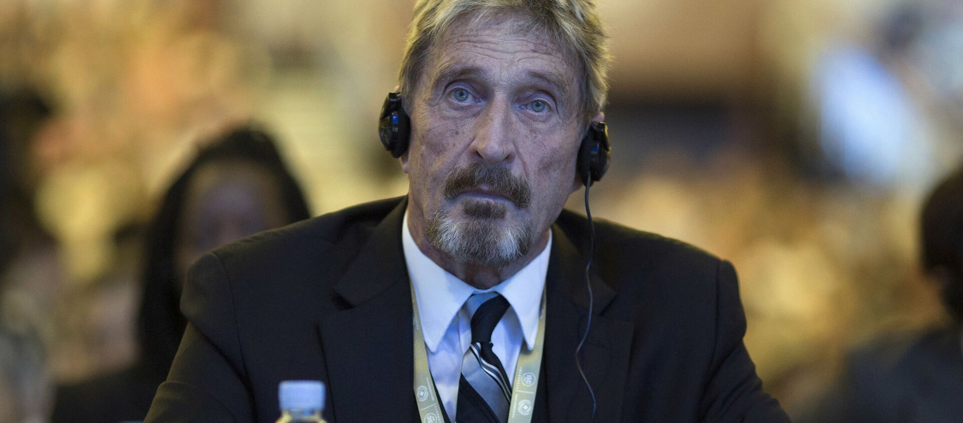 Founder of the first commercial anti-virus program that bore his name, John David McAfee listens during the 4th China Internet Security Conference (ISC) in Beijing, Tuesday, Aug. 16, 201 - Sputnik International, 1920, 06.03.2021