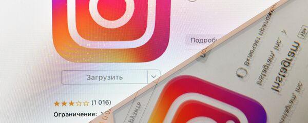 Icon of Instagram social media as seen on a smartphone screen - Sputnik International