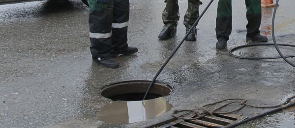 A volunteer woman, who participated in the search for a missing 10-year-old boy in the village of Cheremshan in Tatarstan, Russia, fell into a sewer and discovered the child trapped there A volunteer woman, who participated in the search for a missing 10-year-old boy in the village of Cheremshan in Tatarstan, Russia, fell into a sewer and discovered the child trapped there - Sputnik International