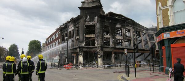 London riots: buildings burn on Tottenham High Road in 2011 London riots: buildings burn on Tottenham High Road in 2011 - Sputnik International