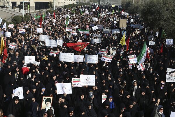 Iranian protesters chant slogans at a rally in Tehran, Iran, Saturday, Dec. 30, 2017 Iranian protesters chant slogans at a rally in Tehran, Iran, Saturday, Dec. 30, 2017 - Sputnik International