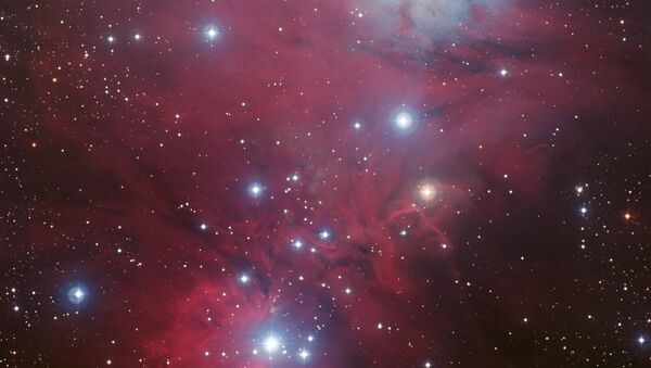 NGC 2264, featuring the inverted Christmas Tree cluster above the cone. The Snowflake nebula in the center shows up better on an infrared version of the image. - Sputnik International