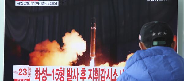 A man watches a TV screen showing what the North Korean government calls the Hwasong-15 intercontinental ballistic missile, at the Seoul Railway Station in Seoul, South Korea, Thursday, Nov. 30, 2017 A man watches a TV screen showing what the North Korean government calls the Hwasong-15 intercontinental ballistic missile, at the Seoul Railway Station in Seoul, South Korea, Thursday, Nov. 30, 2017 - Sputnik International