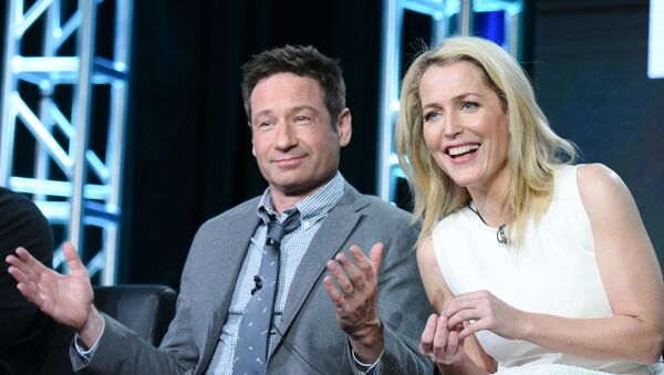 Actors David Duchovny, left, and Gillian Anderson participate in The X Files panel at the Fox Winter TCA on Friday, Jan. 15, 2016, Pasadena, Calif. - Sputnik International