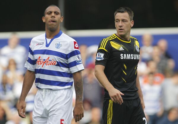 Queens Park Rangers' Anton Ferdinand, left, is marked by Chelsea's John Terry as Chelsea defend a corner during their English Premier League soccer match at Loftus Road stadium, London, Saturday, Sept. 15, 2012. Queens Park Rangers' Anton Ferdinand, left, is marked by Chelsea's John Terry as Chelsea defend a corner during their English Premier League soccer match at Loftus Road stadium, London, Saturday, Sept. 15, 2012. - Sputnik International