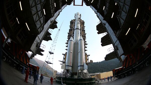 The Long March 3B rocket carrying the Chang'e-3 lunar probe is prepared for launch at the Xichang Satellite Launch Center in Xichang in southwest China's Sichuan province on Sunday, Dec. 1, 2013 - Sputnik International
