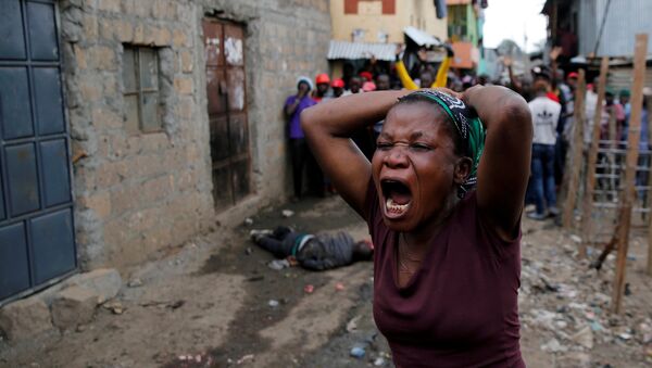 A woman gestures as she mourns the death of a protester in Mathare, in Nairobi, Kenya, August 9, 2017 - Sputnik International