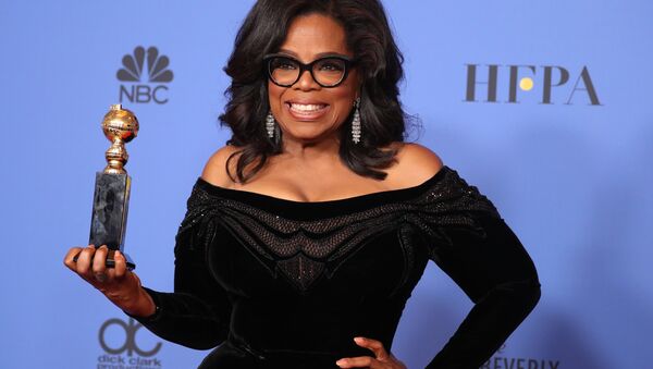75th Golden Globe Awards – Photo Room – Beverly Hills, California, U.S., 07/01/2018 – Oprah Winfrey poses backstage with her Cecil B. DeMille Award - Sputnik International