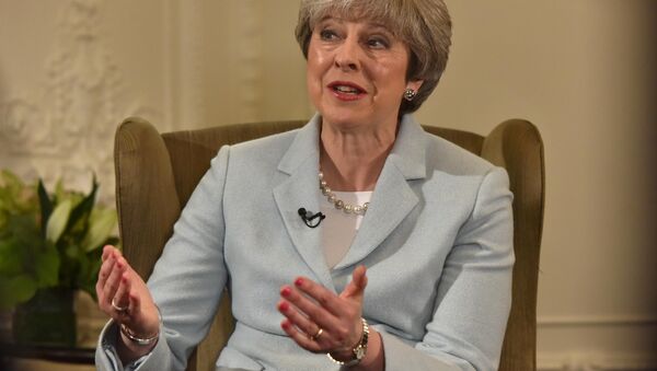 Britain's Prime Minister Theresa May speaks on the BBC's Andrew Marr Show, in this photograph received via the BBC, in her Maidenhead constituency in Britain January 6, 2018 - Sputnik International