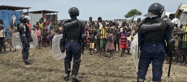 A crowd of displaced people look on as members of the U.N. multi-national police contingent provide security during a visit of UNCHR High Commissioner Filippo Grandi to South Sudan's largest camp for the internally-displaced, in Bentiu, South Sudan Sunday, June 18, 2017 A crowd of displaced people look on as members of the U.N. multi-national police contingent provide security during a visit of UNCHR High Commissioner Filippo Grandi to South Sudan's largest camp for the internally-displaced, in Bentiu, South Sudan Sunday, June 18, 2017 - Sputnik International
