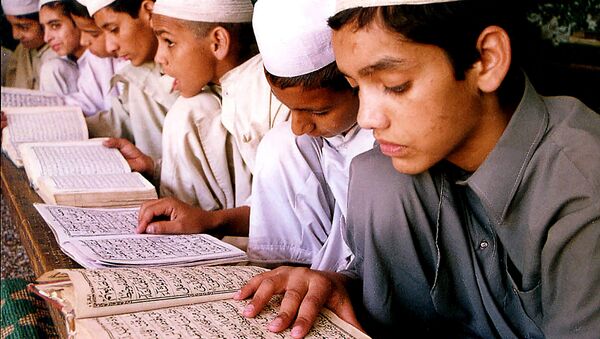 Indian Muslim children read the holy Quran at a madarsa, or institute of Islamic education, in Jammu, India (File) - Sputnik International