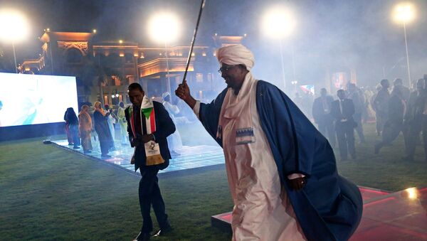 Sudan’s President Omar Al Bashir waves after address the nation during the 62nd Anniversary Independence Day at the Palace in Khartoum, Sudan December 31,2017 - Sputnik International