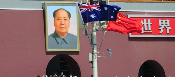 The national flags of Australia and China are displayed before a portrait of Mao Zedong facing Tiananmen Square, during a visit by Australia's Prime Minister Julia Gillard in Beijing on April 26, 2011 The national flags of Australia and China are displayed before a portrait of Mao Zedong facing Tiananmen Square, during a visit by Australia's Prime Minister Julia Gillard in Beijing on April 26, 2011 - Sputnik International