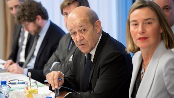France's Foreign Minister Jean-Yves Le Drian and European Union's foreign policy chief Federica Mogherini attend a meeting with Iran's Foreign Minister Mohammad Javad Zarif, Britain's Foreign Secretary Boris Johnson and Germany's Foreign Minister Sigmar Gabriel in Brussels, Belgium - Sputnik International