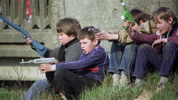Children playing war. File photo - Sputnik International