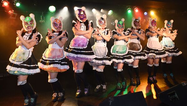 Female idol group Kasotsuka Shojo (Virtual Currency Girls), produced by Japanese idol agency Cinderella Academy, pose on stage in Tokyo - Sputnik International